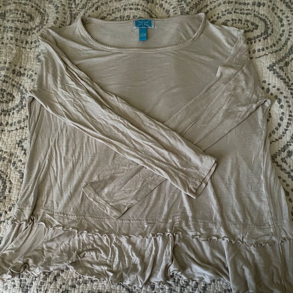 Super cute Survival ruffled shirt! Size large fits a little big!